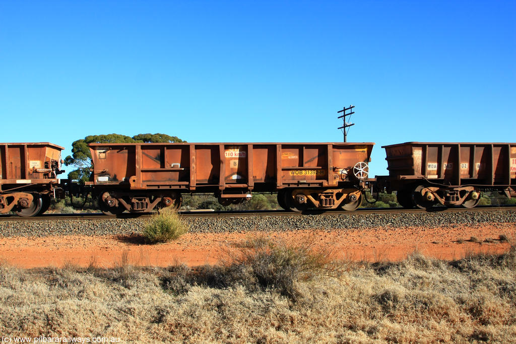 100731 02540
WOB type iron ore waggon WOB 31392 is one of a batch of twenty five built by Comeng WA between 1974 and 1975 and converted from Mt Newman high sided waggons by WAGR Midland Workshops with a capacity of 67 tons with fleet number 317 for Koolyanobbing iron ore operations, this waggon was converted to a WSM ballast hopper, then converted back to a WOB by WAGR Midland Workshops, and started life as a Comeng built Mt Newman Mining ore car in 1974. It was originally numbered 31391 by WAGR, on empty train 6418 at Binduli Triangle, 31st July 2010.
Keywords: WOB-type;WOB31392;Comeng-WA;WSM-type;Mt-Newman-Mining;