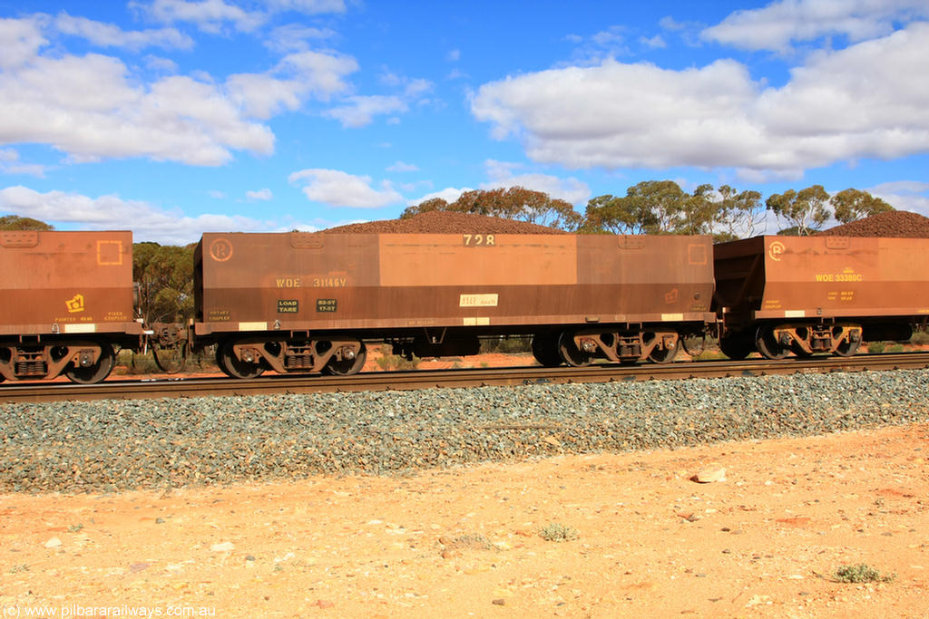 100731 02858
WOE type iron ore waggon WOE 31146 is one of a batch of fifteen built by Goninan WA between April and May 2002 with fleet number 728 for Koolyanobbing iron ore operations, on loaded train 7415 at Binduli Triangle, 31st July 2010.
Keywords: WOE-type;WOE31146;Goninan-WA;