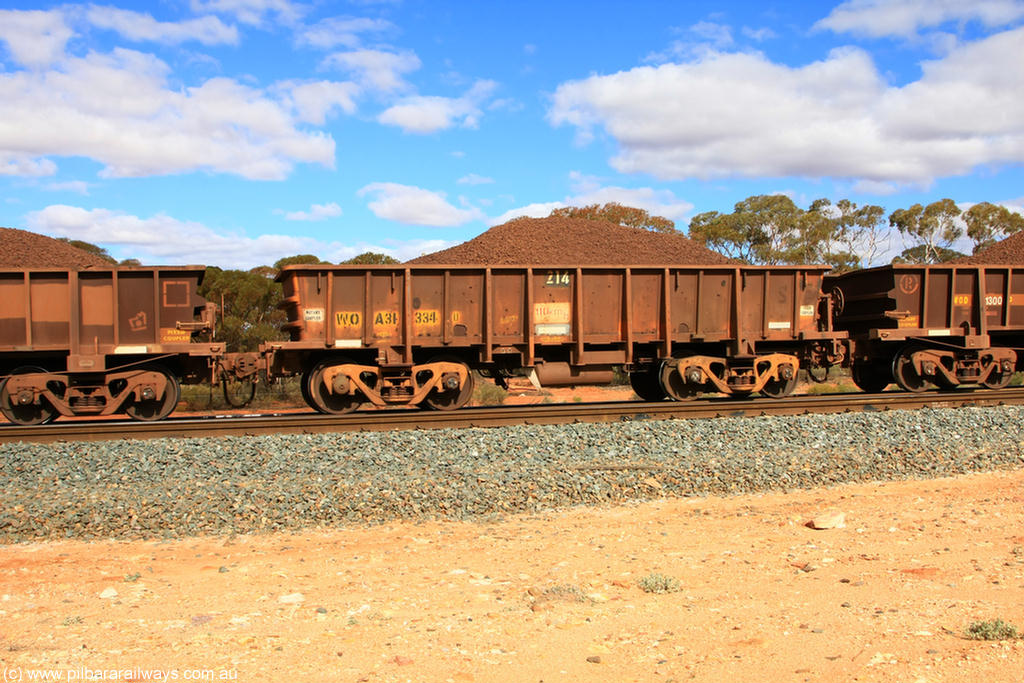 100731 02876
WOA type iron ore waggon WOA 31334 is one of a batch of thirty nine built by WAGR Midland Workshops between 1970 and 1971 with fleet number 214 for Koolyanobbing iron ore operations, with a 75 ton and 1018 ft³ capacity, on loaded train 7415 at Binduli Triangle, 31st July 2010.
Keywords: WOA-type;WOA31334;WAGR-Midland-WS;