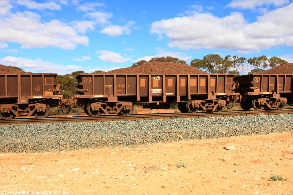 100731 02878
WOD type iron ore waggon WOD 31463 is one of a batch of sixty two built by Goninan WA between April and August 2000 with serial number 950086-035 and fleet number 526 for Koolyanobbing iron ore operations with a 75 ton capacity for Portman Mining to cart their Koolyanobbing iron ore to Esperance, now with PORTMAN painted out, on loaded train 7415 at Binduli Triangle, 31st July 2010.
Keywords: WOD-type;WOD31463;Goninan-WA;950086-035;