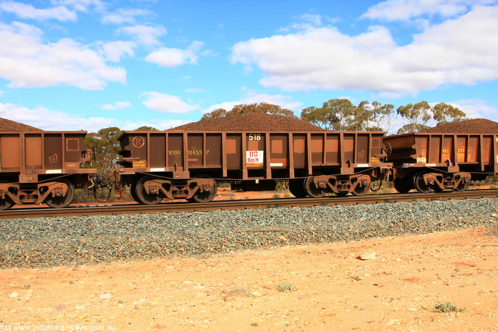 100731 02884
WOD type iron ore waggon WOD 31455 is one of a batch of sixty two built by Goninan WA between April and August 2000 with serial number 950086-027 and fleet number 518 for Koolyanobbing iron ore operations with a 75 ton capacity for Portman Mining to cart their Koolyanobbing iron ore to Esperance, now with PORTMAN painted out, on loaded train 7415 at Binduli Triangle, 31st July 2010.
Keywords: WOD-type;WOD31455;Goninan-WA;950086-027;