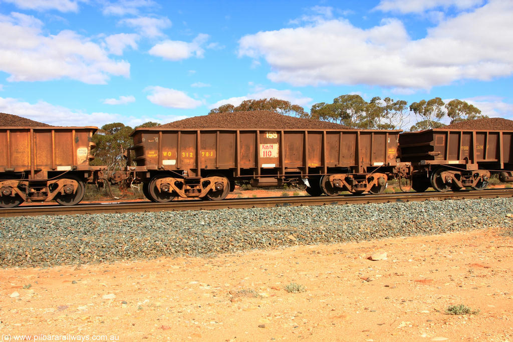 100731 02887
WO type iron ore waggon WO 31278 is one of a batch of eighty six built by WAGR Midland Workshops between 1967 and March 1968 with fleet number 158 for Koolyanobbing iron ore operations, with a 75 ton and 1018 ft³ capacity, on loaded train 7415 at Binduli Triangle, 31st July 2010. This unit was converted to WOC for coal in 1986 till 1994 when it was re-classed back to WO.
Keywords: WO-type;WO31278;WAGR-Midland-WS;