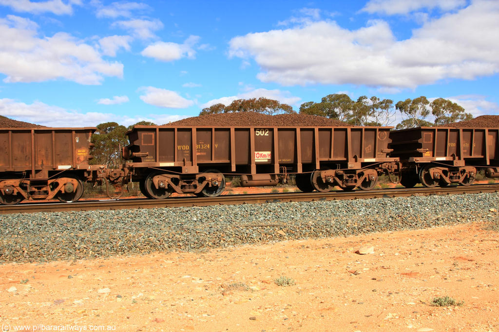 100731 02888
WOD type iron ore waggon WOD 31324 is one of a batch of sixty two built by Goninan WA between April and August 2000 with serial number 950086-012 and fleet number 502 for Koolyanobbing iron ore operations with a 75 ton capacity and a replacement for a WO type waggon number, for Portman Mining to cart their Koolyanobbing iron ore to Esperance, on loaded train 7415 at Binduli Triangle, 31st July 2010.
Keywords: WOD-type;WOD31324;Goninan-WA;950086-012;
