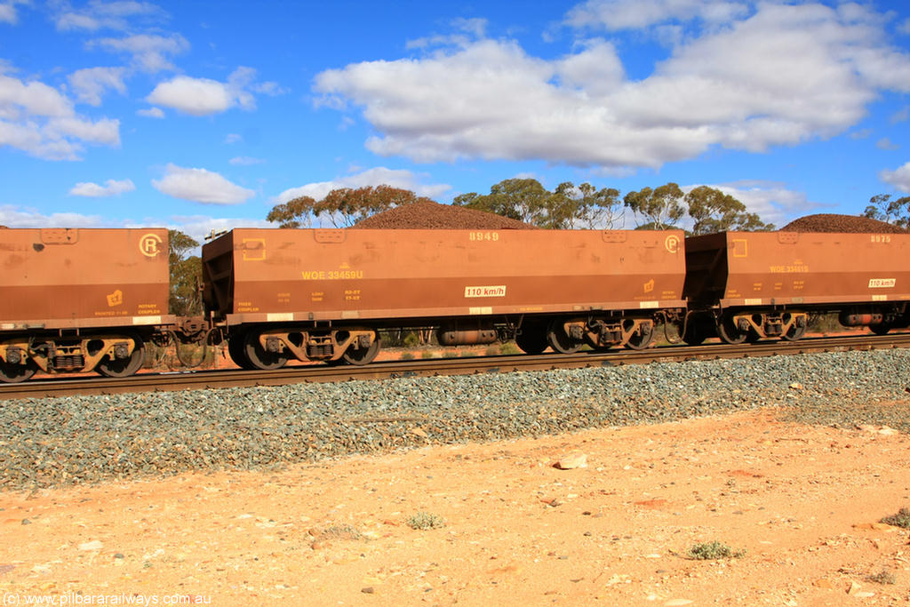 100731 02900
WOE type iron ore waggon WOE 33459 is leader of a batch of one hundred and twenty eight built by United Group Rail WA between August 2008 and March 2009 with serial number 950211-001 and fleet number 8949 for Koolyanobbing iron ore operations, on loaded train 7415 at Binduli Triangle, 31st July 2010.
Keywords: WOE-type;WOE33459;United-Group-Rail-WA;950211-001;