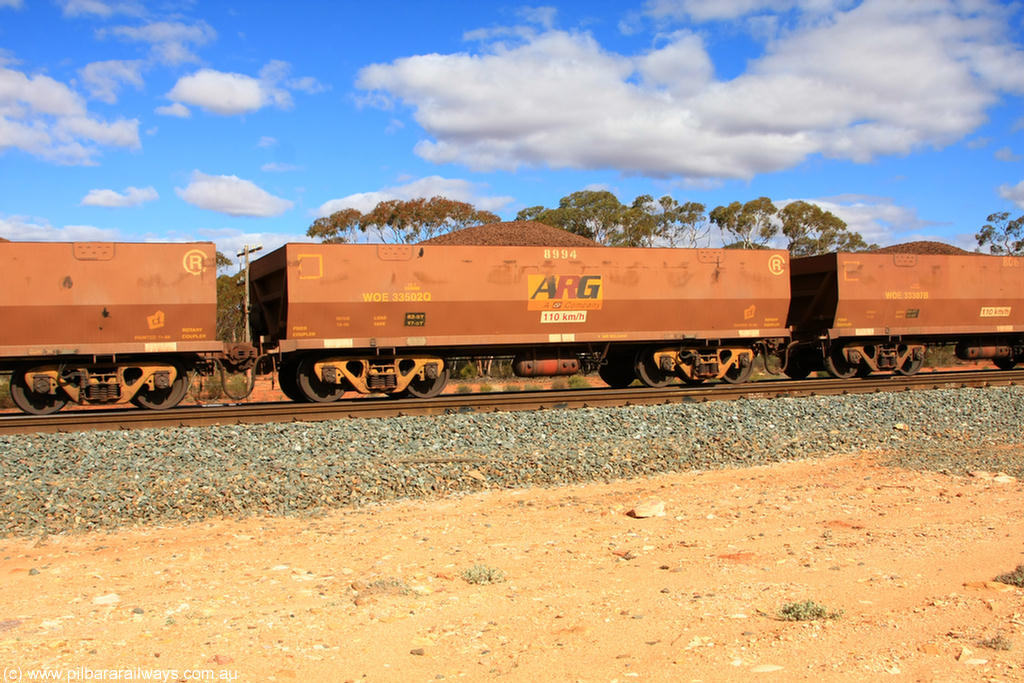 100731 02905
WOE type iron ore waggon WOE 33502 is one of a batch of one hundred and twenty eight built by United Group Rail WA between August 2008 and March 2009 with serial number 950211-042 and fleet number 8994 for Koolyanobbing iron ore operations, on loaded train 7415 at Binduli Triangle, 31st July 2010.
Keywords: WOE-type;WOE33502;United-Group-Rail-WA;950211-042;