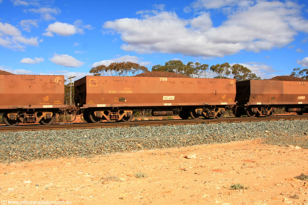 100731 02910
WOE type iron ore waggon WOE 33300 is one of a batch of one hundred and forty one built by United Goninan WA between November 2005 and April 2006 with serial number 950142-005 and fleet number 799 for Koolyanobbing iron ore operations, on loaded train 7415 at Binduli Triangle, 31st July 2010.
Keywords: WOE-type;WOE33300;United-Goninan-WA;950142-005;