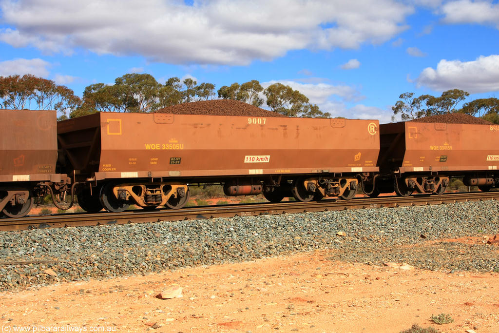 100731 02930
WOE type iron ore waggon WOE 33505 is one of a batch of one hundred and twenty eight built by United Group Rail WA between August 2008 and March 2009 with serial number 950211-045 and fleet number 9007 for Koolyanobbing iron ore operations, on loaded train 7415 at Binduli Triangle, 31st July 2010.
Keywords: WOE-type;WOE33505;United-Group-Rail-WA;950211-045;