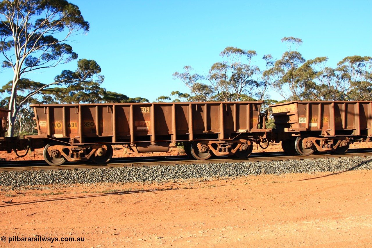 100731 03079
WOA type iron ore waggon WOA 31320 is one of a batch of thirty nine built by WAGR Midland Workshops between 1970 and 1971 with fleet number 209 for Koolyanobbing iron ore operations, with a 75 ton and 1018 ft³ capacity, empty train arriving at Binduli Triangle, 31st July 2010.
Keywords: WOA-type;WOA31320;WAGR-Midland-WS;