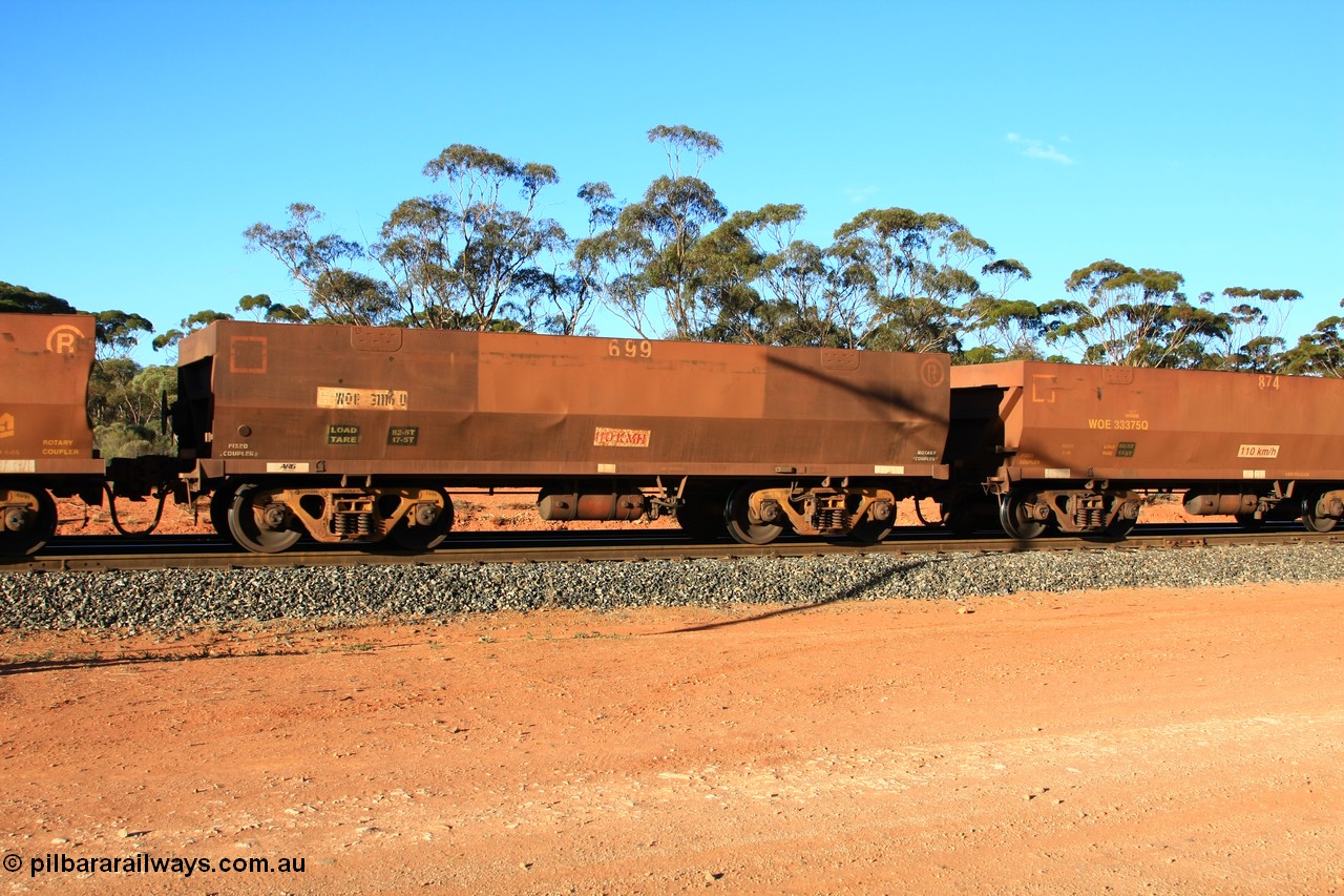 100731 03153
WOE type iron ore waggon WOE 31116 is one of a batch of one hundred and thirty built by Goninan WA between March and August 2001 with serial number 950092-106 and fleet number 699 for Koolyanobbing iron ore operations with PORTMAN painted out and the load revised to 82.5 tonnes, empty train arriving at Binduli Triangle, 31st July 2010.
Keywords: WOE-type;WOE31116;Goninan-WA;950092-106;