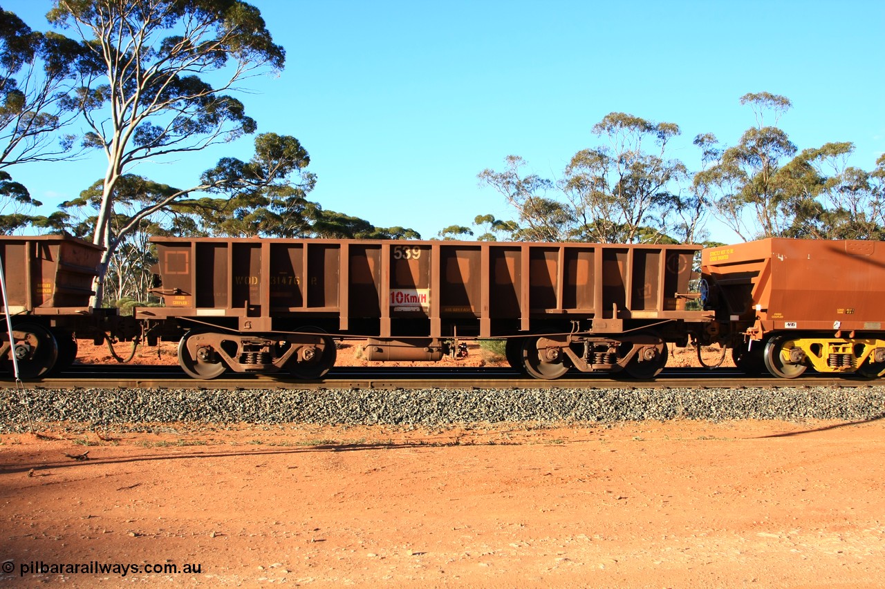 100731 03163
WOD type iron ore waggon WOD 31476 is one of a batch of sixty two built by Goninan WA between April and August 2000 with serial number 950086-048 and fleet number 539 for Koolyanobbing iron ore operations with a 75 ton capacity with a build date of 07/2000, for Portman Mining to cart their Koolyanobbing iron ore to Esperance, with the letters now painted over, empty train arriving at Binduli Triangle, 31st July 2010.
Keywords: WOD-type;WOD31476;Goninan-WA;950086-048;