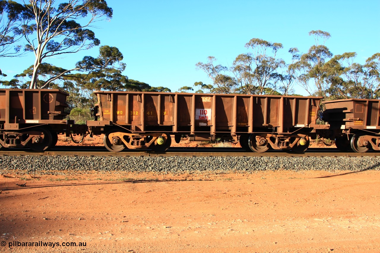 100731 03169
WO type iron ore waggon WO 31241 is one of a batch of eighty six built by WAGR Midland Workshops between 1967 and March 1968 with fleet number 132 for Koolyanobbing iron ore operations, with a 75 ton and 1018 ft³ capacity, empty train arriving at Binduli Triangle, 31st July 2010. This unit was converted to WOS superphosphate in the late 1980s till 1994 when it was re-classed back to WO.
Keywords: WO-type;WO31241;WAGR-Midland-WS;WOS-type;