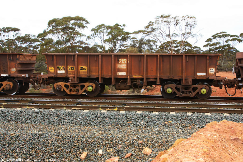 100822 5861
WOA type iron ore waggon WOA 31335 is one of a batch of thirty nine built by WAGR Midland Workshops between 1970 and 1971 with fleet number 215 for Koolyanobbing iron ore operations, with a 75 ton and 1018 ft³ capacity, Binduli Triangle 22nd August 2010.
Keywords: WOA-type;WOA31335;WAGR-Midland-WS;