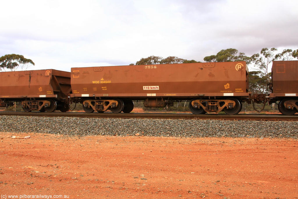 100822 5925
WOE type iron ore waggon WOE 33454 is leader of a batch of five built by United Group Rail WA between August and September 2008 with serial number 950210-001 and fleet number 8958 for Koolyanobbing iron ore operations, Binduli Triangle 22nd August 2010.
Keywords: WOE-type;WOE33454;United-Group-Rail-WA;950210-001;