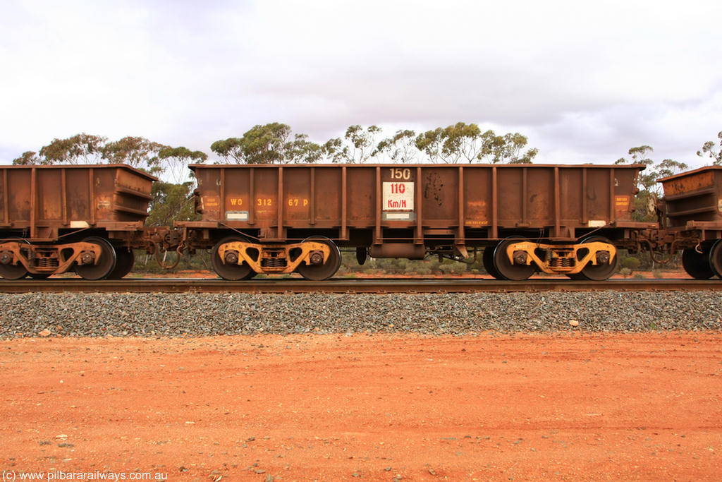 100822 5932
WO type iron ore waggon WO 31267 is one of a batch of eighty six built by WAGR Midland Workshops between 1967 and March 1968 with fleet number 150 for Koolyanobbing iron ore operations, with a 75 ton and 1018 ft³ capacity, Binduli Triangle 22nd August 2010. This unit was converted to WOC for coal in 1986 till 1994 when it was re-classed back to WO.
Keywords: WO-type;WO31267;WAGR-Midland-WS;