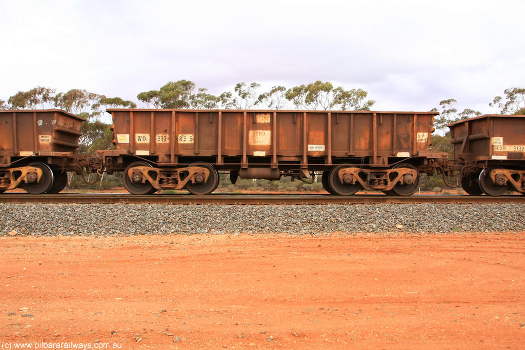 100822 5941
WO type iron ore waggon WO 31283 is one of a batch of eighty six built by WAGR Midland Workshops between 1967 and March 1968 with fleet number 163 for Koolyanobbing iron ore operations, with a 75 ton and 1018 ft³ capacity, Binduli Triangle 22nd August 2010. This unit was converted to WOS superphosphate in the late 1980s till 1994 when it was re-classed back to WO.
Keywords: WO-type;WO31283;31283;WAGR-Midland-WS;WOS-type;
