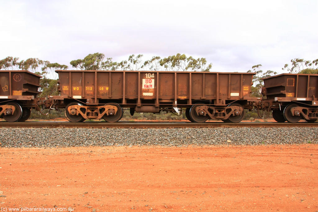 100822 5956
WO type iron ore waggon WO 31208 is one of a batch of eighty six built by WAGR Midland Workshops between 1967 and March 1968 with fleet number 104 for Koolyanobbing iron ore operations, with a 75 ton and 1018 ft³ capacity, Binduli Triangle 22nd August 2010. This unit was converted to WOC for coal in 1986 till 1994 when it was re-classed back to WO.
Keywords: WO-type;WO31208;WAGR-Midland-WS;