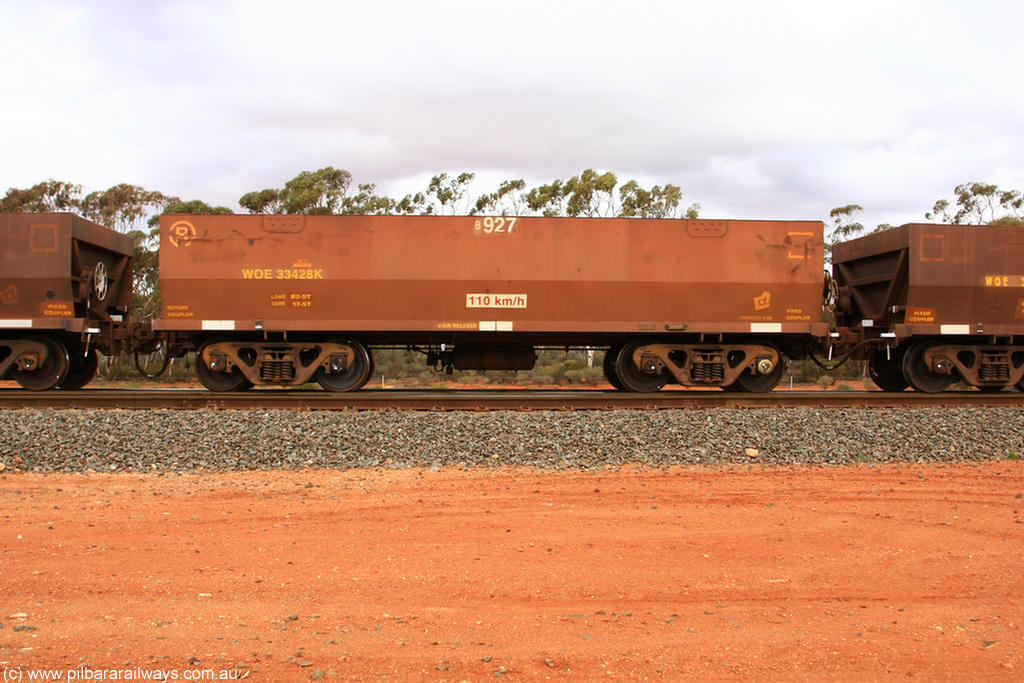 100822 5959
WOE type iron ore waggon WOE 33428 is one of a batch of one hundred and forty one built by United Group Rail WA between November 2005 and April 2006 with serial number 950142-133 and fleet number 8927 for Koolyanobbing iron ore operations, Binduli Triangle 22nd August 2010.
Keywords: WOE-type;WOE33428;United-Group-Rail-WA;950142-133;