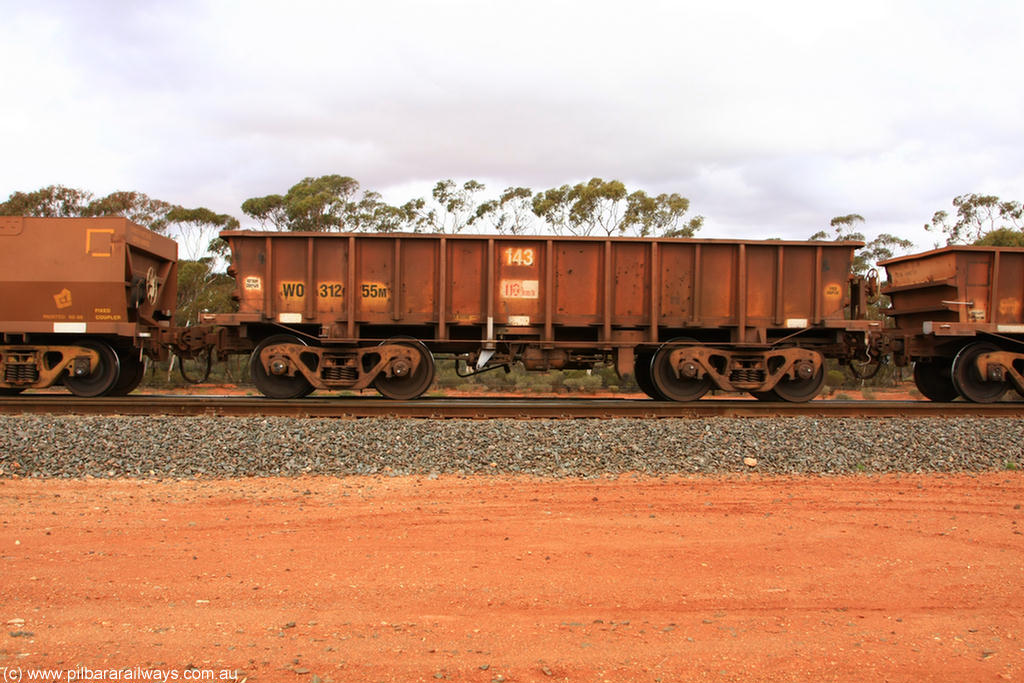 100822 5968
WO type iron ore waggon WO 31255 is one of a batch of eighty six built by WAGR Midland Workshops between 1967 and March 1968 with fleet number 143 for Koolyanobbing iron ore operations, with a 75 ton and 1018 ft³ capacity, Binduli Triangle 22nd August 2010. This unit was converted to WOC for coal in 1986 till 1996 when it was re-classed back to WO.
Keywords: WO-type;WO31255;WAGR-Midland-WS;