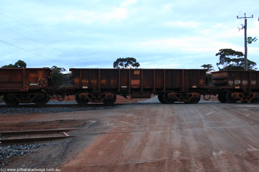 100822 6261
WOA type iron ore waggon WOA 31339 is one of a batch of thirty nine built by WAGR Midland Workshops between 1970 and 1971 with fleet number 217 for Koolyanobbing iron ore operations, with a 75 ton and 1018 ft³ capacity, on empty train 1416 at Hampton, 22nd August 2010.
Keywords: WOA-type;WOA31339;WAGR-Midland-WS;