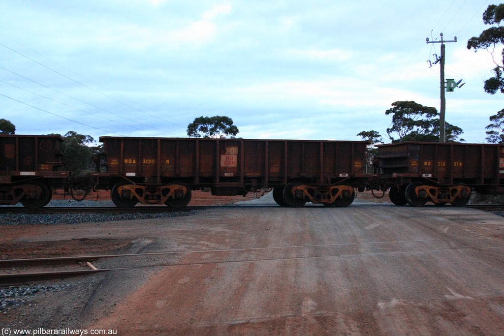 100822 6271
WOA type iron ore waggon WOA 31315 is one of a batch of thirty nine built by WAGR Midland Workshops between 1970 and 1971 with fleet number 208 for Koolyanobbing iron ore operations, with a 75 ton and 1018 ft³ capacity, on empty train 1416 at Hampton, 22nd August 2010.
Keywords: WOA-type;WOA31315;WAGR-Midland-WS;