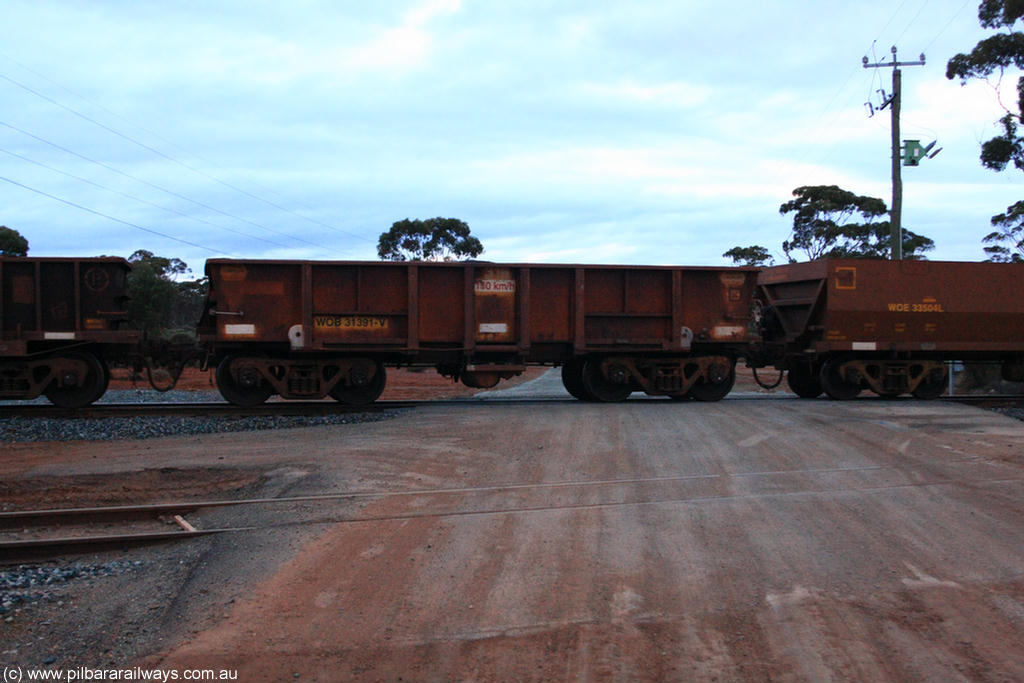 100822 6277
WOB type iron ore waggon WOB 31391 is one of a batch of twenty five built by Comeng WA between 1974 and 1975 and converted from Mt Newman high sided waggons by WAGR Midland Workshops with a capacity of 67 tons with fleet number 316 for Koolyanobbing iron ore operations. This waggon was also converted to a WSM type ballast hopper by re-fitting the cut down top section and having bottom discharge doors fitted, converted back to WOB in 1998, on empty train 1416 at Hampton, 22nd August 2010.
Keywords: WOB-type;WOB31391;Comeng-WA;WSM-type;Mt-Newman-Mining;