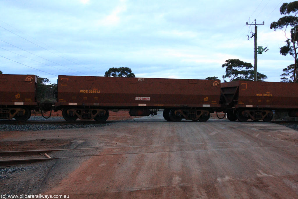 100822 6300
WOE type iron ore waggon WOE 33561 is one of a batch of one hundred and twenty eight built by United Group Rail WA between August 2008 and March 2009 with serial number 950211-101 and fleet number 9051 for Koolyanobbing iron ore operations, on empty train 1416 at Hampton, 22nd August 2010.
Keywords: WOE-type;WOE33561;United-Group-Rail-WA;950211-101;