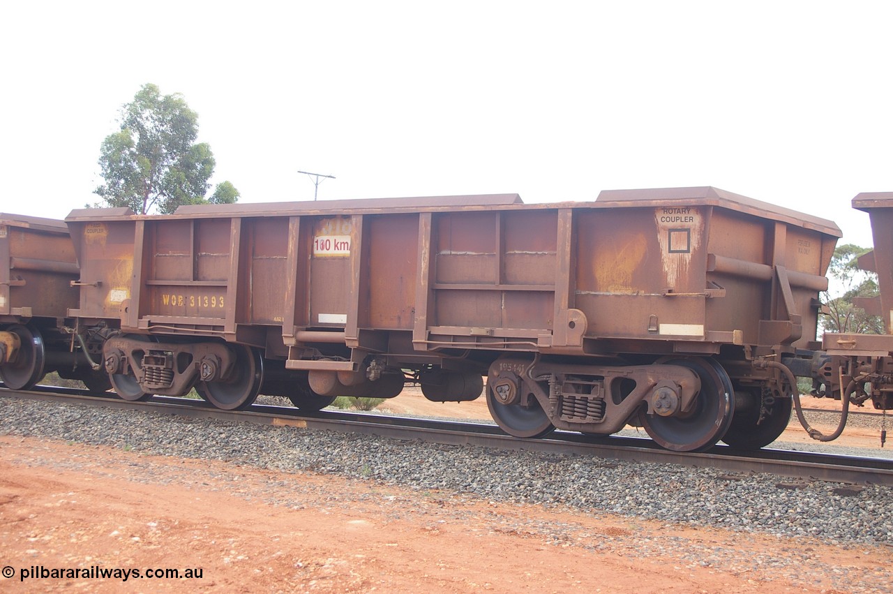 PD 12412
Binduli, WOB type iron ore waggon WOB 31393 is one of a batch of twenty five built by Comeng WA between 1974 and 1975 and converted from Mt Newman high sided waggons by WAGR Midland Workshops with a capacity of 67 tons with fleet number 318 for Koolyanobbing iron ore operations. This waggon was also converted to a WSM type ballast hopper by re-fitting the cut down top section and having bottom discharge doors fitted, converted back to WOB in 1998, and shows signs of heavy re-sheeting, returning empty to Koolyanobbing, 17th Feb 2013.
Keywords: Peter-D-Image;WOB-type;WOB31393;Comeng-WA;WSM-type;Mt-Newman-Mining;