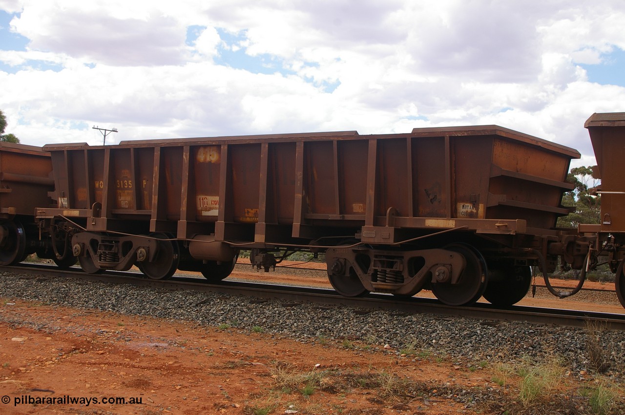 PD 12413
Binduli, WOC type iron ore waggon WOC 31355 is one of a batch of thirty built by Goninan WA between October 1997 to January 1998 with fleet number 415 for Koolyanobbing iron ore operations with a 75 ton capacity, note the added angled lip to the top of the body. 17th Feb 2013.
Keywords: Peter-D-Image;WOC-type;WOC31355;Goninan-WA;