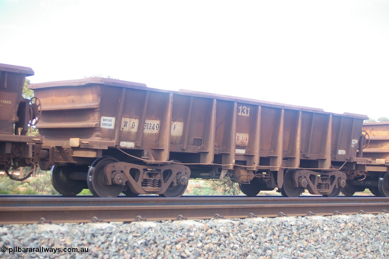 PD 12612
Binduli, WO type iron ore waggon WO 31240 is one of a batch of eighty six built by WAGR Midland Workshops between 1967 and March 1968 with fleet number 131 for Koolyanobbing iron ore operations, with a 75 ton and 1018 ft³ capacity, this unit was converted to WOC for coal in 1986 till 1994 when it was re-classed back to WO. Seen here with the body top lip also fitted.
Keywords: Peter-D-Image;WO-type;WO31240;WAGR-Midland-WS;