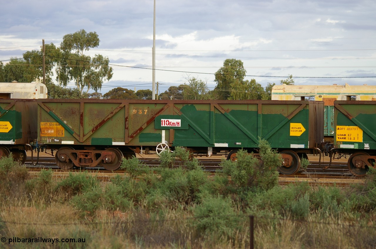 PD 12865
West Kalgoorlie, AOPY 32408 with fleet number 937, was renumbered to 4906 but the 4 has been removed, one of seventy ex ANR coal waggons rebuilt from AOKF type by Bluebird Engineering SA in service with ARG on Koolyanobbing iron ore trains. They used to be three metres longer and originally built by Metropolitan Cammell Britain as GB type in 1952-55, seen here in a rake with sister waggons.
Keywords: Peter-D-Image;AOPY-type;AOPY32408;Bluebird-Engineering-SA;Metropolitan-Cammell-Britain;GB-type;