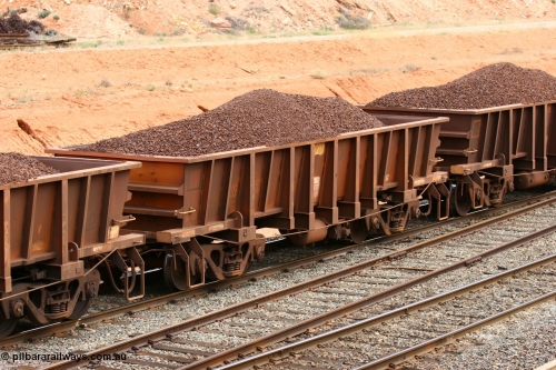 060116 2689
WOC type iron ore waggon WOC 31360 is one of a batch of thirty built by Goninan WA between October 1997 to January 1998 with fleet number 420 for Koolyanobbing iron ore operations with a 75 ton capacity and lettered for KIPL, Koolyanobbing Iron Pty Ltd, seen here loaded with lump ore, West Kalgoorlie 16th January 2006.
Keywords: WOC-type;WOC31360;Goninan-WA;