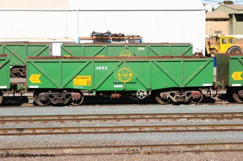 060528 4434
West Kalgoorlie, AOPY 34097, fleet number 4963, the 4 is a recent addition, is a drop floor version, one of seventy ex ANR coal waggons rebuilt from AOKF type by Bluebird Engineering SA in service with ARG on Koolyanobbing iron ore trains. They used to be three metres longer and originally built by Metropolitan Cammell Britain as GB type in 1952-55, May 28, 2006.
Keywords: AOPY-type;AOPY34097;Bluebird-Engineering-SA;Metropolitan-Cammell-Britain;GB-type;