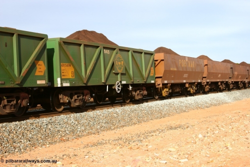 060531 5009
Binduli, AOPY 34079, fleet number 945, one of seventy ex ANR coal waggons rebuilt from AOKF type by Bluebird Engineering SA in service with ARG on Koolyanobbing iron ore trains. They used to be three metres longer and originally built by Metropolitan Cammell Britain as GB type in 1952-55, seen here in the consist with sister waggons and WOE type waggons, on a loaded train bound for West Kalgoorlie, May 31, 2006
Keywords: AOPY-type;AOPY34079;Bluebird-Engineering-SA;Metropolitan-Cammell-Britain;GB-type;