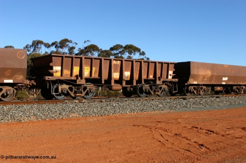 070531 9728
WOC type iron ore waggon WOC 31361 is one of a batch of thirty built by Goninan WA between October 1997 to January 1998 with fleet number 421 and build date of 12/1997, for Koolyanobbing iron ore operations with a 75 ton capacity and lettered for KIPL, Koolyanobbing Iron Pty Ltd, on an empty train at Binduli, May 31, 2007.
Keywords: WOC-type;WOC31361;Goninan-WA;