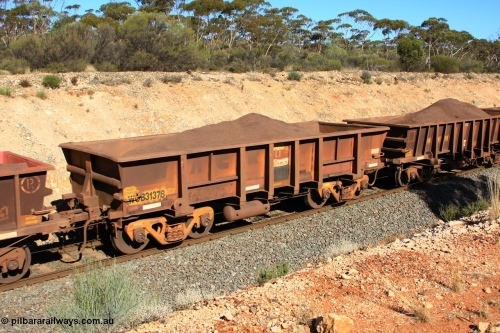 100602 8543
WOB type iron ore waggon WOB 31378 is one of a batch of twenty five built by Comeng WA between 1974 and 1975 and converted from Mt Newman high sided waggons by WAGR Midland Workshops with a capacity of 67 tons with fleet number 303 for Koolyanobbing iron ore operations, seen here west of Binduli, June 2, 2010.
Keywords: WOB-type;WOB31378;Comeng-WA;Mt-Newman-Mining;