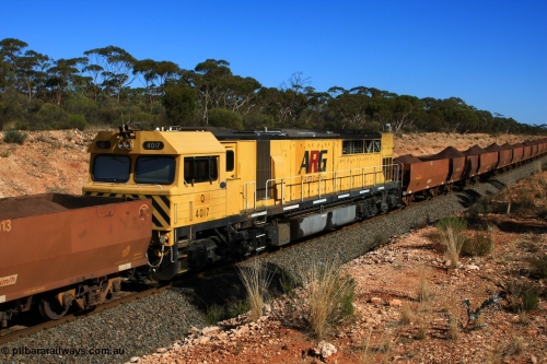 100602 8571
Binduli, standard gauge former Westrail Q class locomotive Q 4017 Clyde Engineering EMD model GT46C serial 98-1470, seen here in mid-train service as the DPU unit on an Esperance bound loaded Koolyanobbing iron ore train in amongst WOE type iron ore waggons, June 2, 2010.
Keywords: Q-class;Q4017;Clyde-Engineering-Forrestfield-WA;EMD;GT46C;98-1470;Q317;