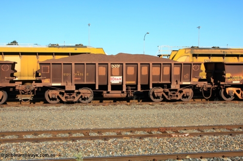 100602 8696
WOD type iron ore waggon WOD 31476 is one of a batch of sixty two built by Goninan WA between April and August 2000 with serial number 950086-048 and fleet number 539 for Koolyanobbing iron ore operations with a 75 ton capacity with a build date of 07/2000, for Portman Mining to cart their Koolyanobbing iron ore to Esperance, with the letters now painted over, loaded with fines, West Kalgoorlie June 2, 2010.
Keywords: WOD-type;WOD31476;Goninan-WA;950086-048;