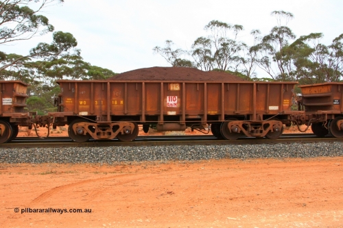 100605 9365
WO type iron ore waggon WO 31218 is one of a batch of eighty six built by WAGR Midland Workshops between 1967 and March 1968 with fleet number 113 for Koolyanobbing iron ore operations, with a 75 ton and 1018 ft³ capacity, Binduli Triangle, loaded with fines, June 5, 2010. This unit was converted to WOS superphosphate in the late 1980s till 1994 when it was re-classed back to WO.
Keywords: WO-type;WO31218;WAGR-Midland-WS;WOS-type;