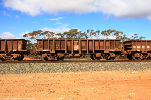 100729 01492
WOD type iron ore waggon WOD 31450 is one of a batch of sixty two built by Goninan WA between April and August 2000 with serial number 950086-022 and fleet number 513 for Koolyanobbing iron ore operations with a 75 ton capacity for Portman Mining to cart their Koolyanobbing iron ore to Esperance. Seen here on an empty train with PORTMAN painted out, Binduli Triangle, empty train July 29, 2010.
Keywords: WOD-type;WOD31450;Goninan-WA;950086-022;