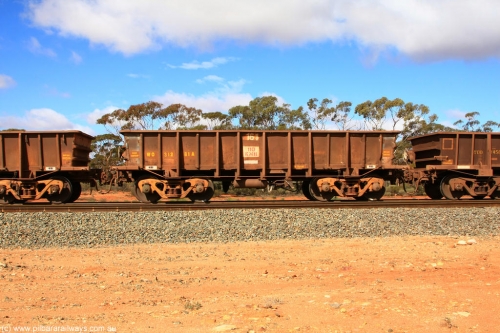 100729 01493
WO type iron ore waggon WO 31281 is one of a batch of eighty six built by WAGR Midland Workshops between 1967 and March 1968 with fleet number 161 for Koolyanobbing iron ore operations, with a 75 ton and 1018 ft³ capacity, Binduli Triangle, empty train July 29, 2010. This unit was converted to WOC for coal in 1986 till 1994 when it was re-classed back to WO.
Keywords: WO-type;WO31281;WAGR-Midland-WS;