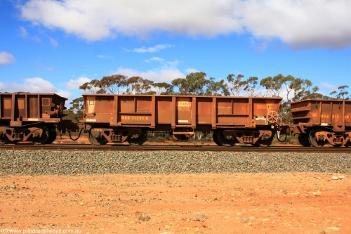 100729 01504
WOB type iron ore waggon WOB 31393 is one of a batch of twenty five built by Comeng WA between 1974 and 1975 and converted from Mt Newman high sided waggons by WAGR Midland Workshops with a capacity of 67 tons with fleet number 318 for Koolyanobbing iron ore operations. This waggon was also converted to a WSM type ballast hopper by re-fitting the cut down top section and having bottom discharge doors fitted, converted back to WOB in 1998, returning empty to Koolyanobbing at Binduli, July 29, 2010.
Keywords: WOB-type;WOB31393;Comeng-WA;WSM-type;Mt-Newman-Mining;