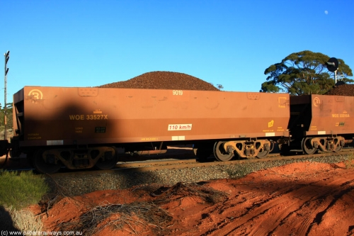 100731 02284
WOE type iron ore waggon WOE 33527 is one of a batch of one hundred and twenty eight built by United Group Rail WA between August 2008 and March 2009 with serial number 950211-067 and fleet number 9019 for Koolyanobbing iron ore operations, on loaded train 6413 at Binduli Triangle, July 31, 2010.
Keywords: WOE-type;WOE33527;United-Group-Rail-WA;950211-067;