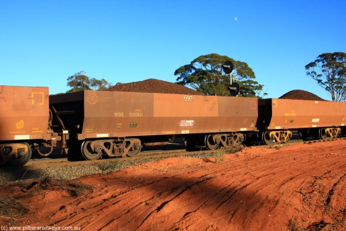 100731 02304
WOE type iron ore waggon WOE 31106 is one of a batch of one hundred and thirty built by Goninan WA between March and August 2001 with serial number 950092-096 and fleet number 690 for Koolyanobbing iron ore operations, on loaded train 6413 at Binduli Triangle, July 31, 2010.
Keywords: WOE-type;WOE31106;Goninan-WA;950092-096;