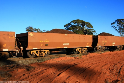 100731 02307
WOE type iron ore waggon WOE 33507 is one of a batch of one hundred and twenty eight built by United Group Rail WA between August 2008 and March 2009 with serial number 950211-047 and fleet number 9021 for Koolyanobbing iron ore operations, on loaded train 6413 at Binduli Triangle, July 31, 2010.
Keywords: WOE-type;WOE33507;United-Group-Rail-WA;950211-047;