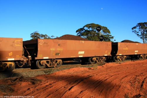 100731 02308
WOE type iron ore waggon WOE 33271 is one of a batch of thirty five built by Goninan WA between January and April 2005 with serial number 950104-011 and fleet number 770 for Koolyanobbing iron ore operations, on loaded train 6413 at Binduli Triangle, July 31, 2010.
Keywords: WOE-type;WOE33271;Goninan-WA;950104-011;