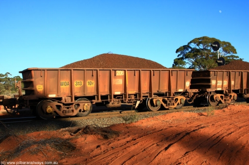 100731 02351
WOA type iron ore waggon WOA 31310 is one of a batch of thirty nine built by WAGR Midland Workshops between 1970 and 1971 with fleet number 206 for Koolyanobbing iron ore operations, with a 75 ton and 1018 ft³ capacity, on loaded train 6413 at Binduli Triangle, July 31, 2010.
Keywords: WOA-type;WOA31310;WAGR-Midland-WS;