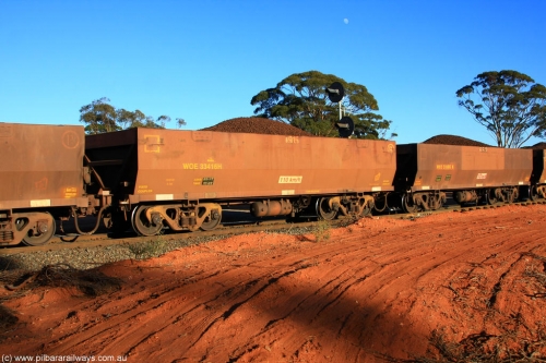 100731 02377
WOE type iron ore waggon WOE 33416 is one of a batch of one hundred and forty one built by United Group Rail WA between November 2005 and April 2006 with serial number 950142-121 and fleet number 8915 for Koolyanobbing iron ore operations, on loaded train 6413 at Binduli Triangle, 31st July 2010.
Keywords: WOE-type;WOE33416;United-Group-Rail-WA;950142-121;