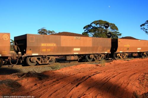 100731 02396
WOE type iron ore waggon WOE 31085 is one of a batch of one hundred and thirty built by Goninan WA between March and August 2001 with serial number 950092-075 and fleet number 670 for Koolyanobbing iron ore operations, on loaded train 6413 at Binduli Triangle, July 31, 2010.
Keywords: WOE-type;WOE31085;Goninan-WA;950092-075;