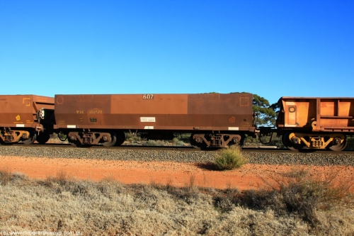100731 02427
WOE type iron ore waggon WOE 30257 is one of a batch of one hundred and thirty built by Goninan WA between March and August 2001 with serial number 950092-007 and fleet number 607 for Koolyanobbing iron ore operations, on empty train 6418 at Binduli Triangle, July 31, 2010.
Keywords: WOE-type;WOE30257;Goninan-WA;950092-007;