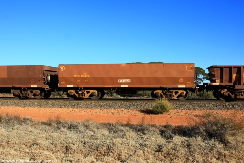 100731 02441
WOE type iron ore waggon WOE 33517 is one of a batch of one hundred and twenty eight built by United Group Rail WA between August 2008 and March 2009 with serial number 950211-057 and fleet number 9010 for Koolyanobbing iron ore operations, on empty train 6418 at Binduli Triangle, July 31, 2010.
Keywords: WOE-type;WOE33517;United-Group-Rail-WA;950211-057;